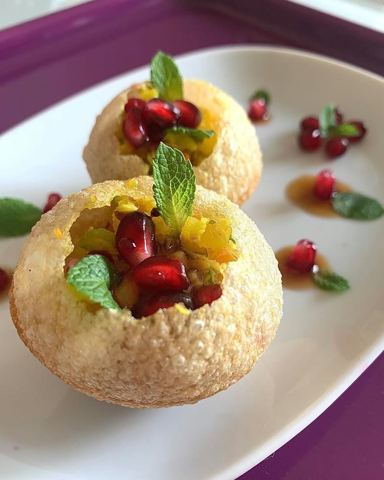 Pani puri filled with potato and pomegranate